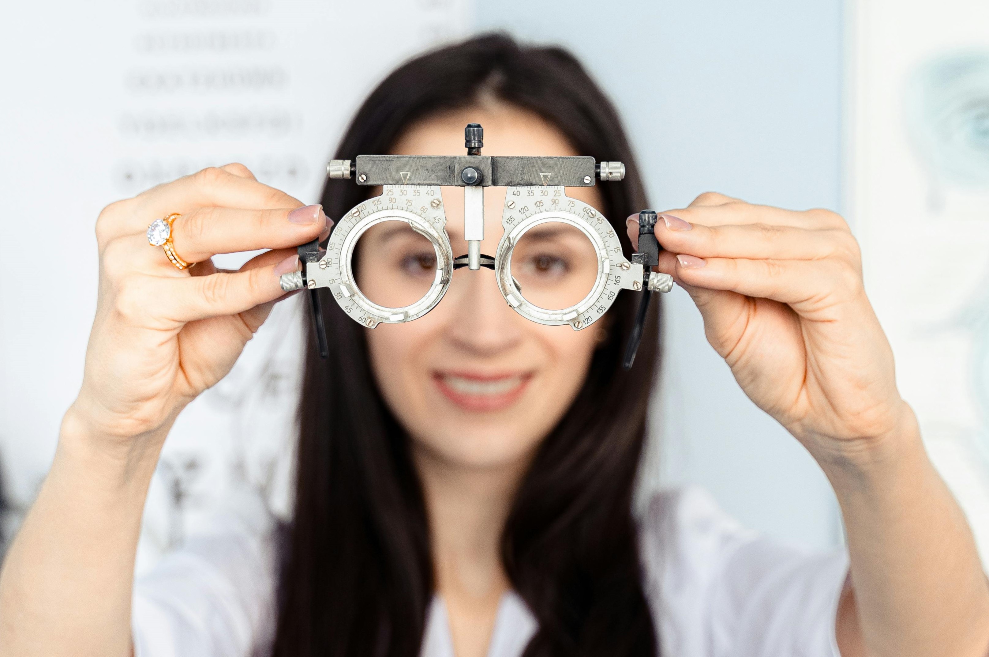 A woman holding a trial frame